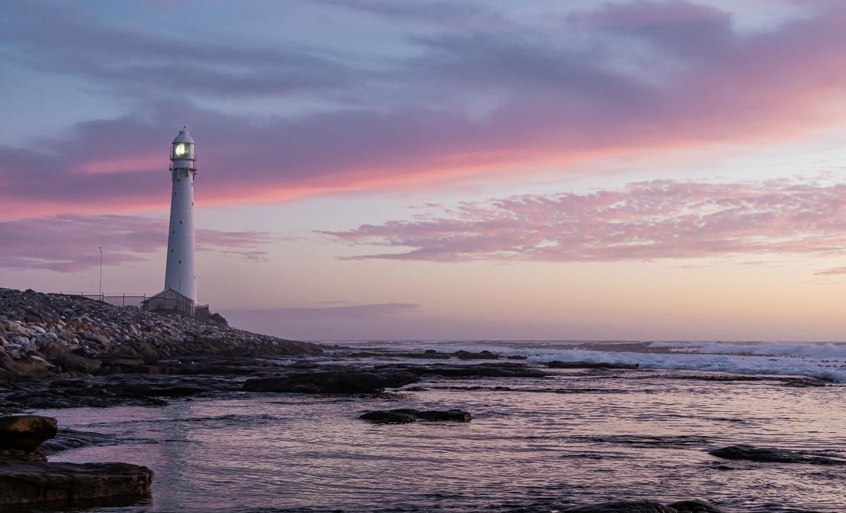 Moody image of a lighthouse at dusk